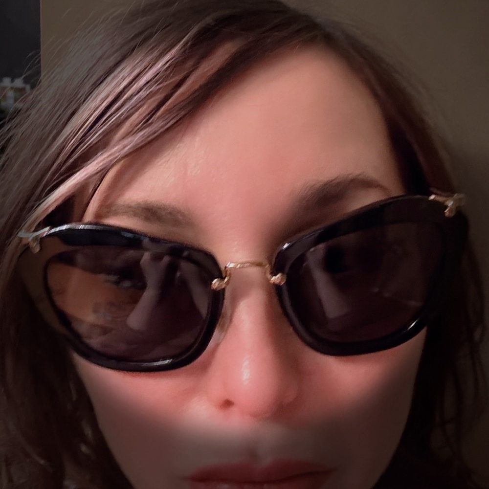 Chic Miu Miu Black and Gold Sunglasses with Cat-Eye Design, like New
